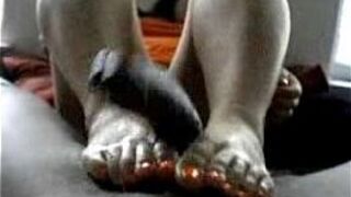 Asian wife gives black hubby nice footjob - porn video